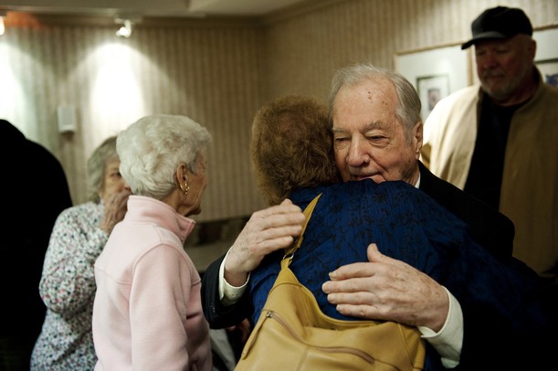 Glenn Dickerson welcomes his daughter-in-law Vonda Dickerson to his award ceremony at Weber's in Ann Arbor on Tuesday. Glenn is being awarded with the Knight of the Legion of Honor for his efforts in World War II. Daniel Brenner I AnnArbor.com